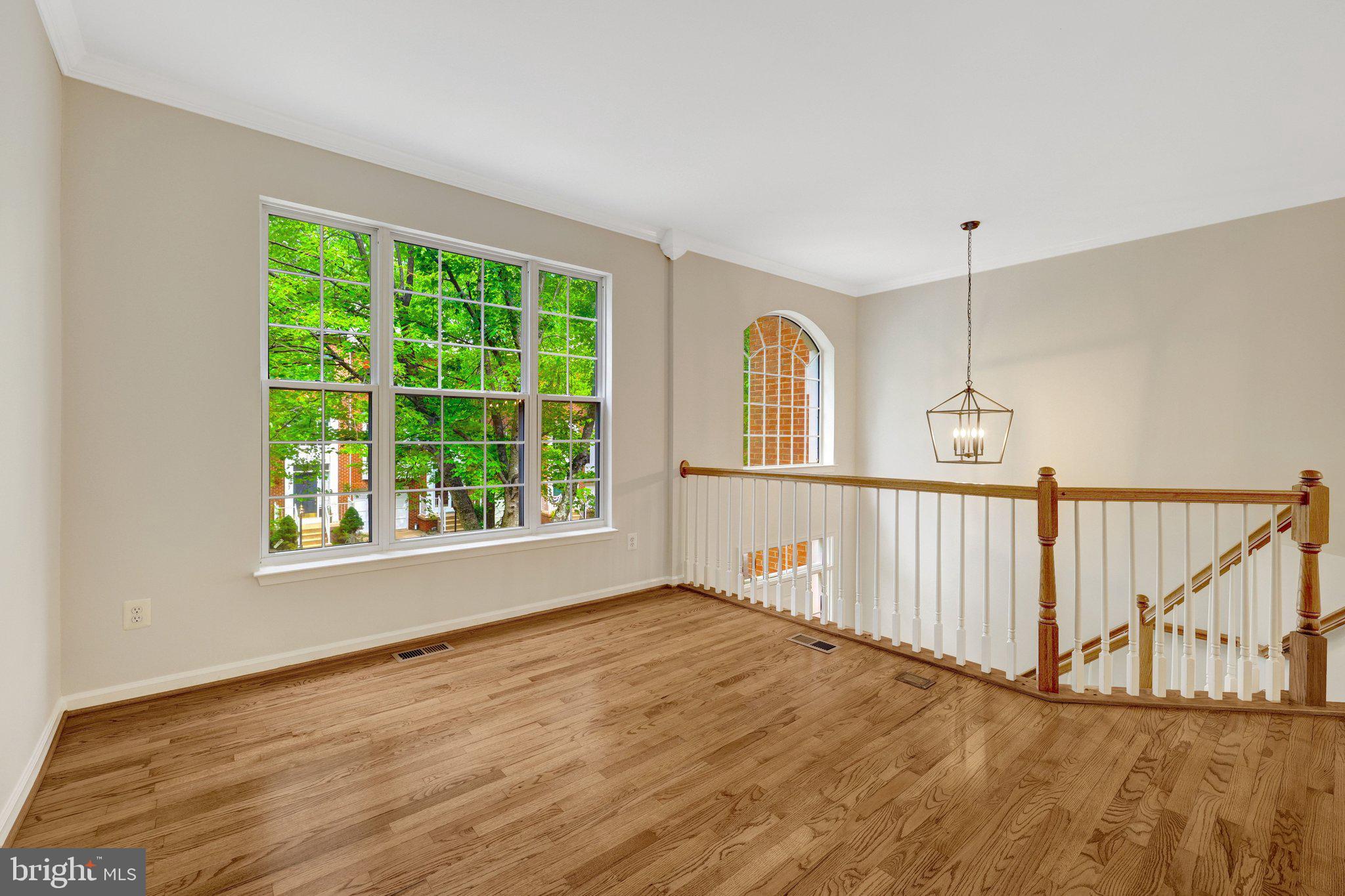 1268 Wild Hawthorn Way Reston, VA 20194 - Photo 6 of 55 Gleaming Hardwood Floors throughout the main level