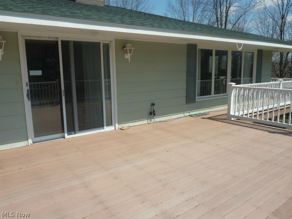 16384 Burrows Road Thompson, OH 44086 - Photo 13 of 25 slider from main level to deck = great for grilling, entertaining, and chilling!