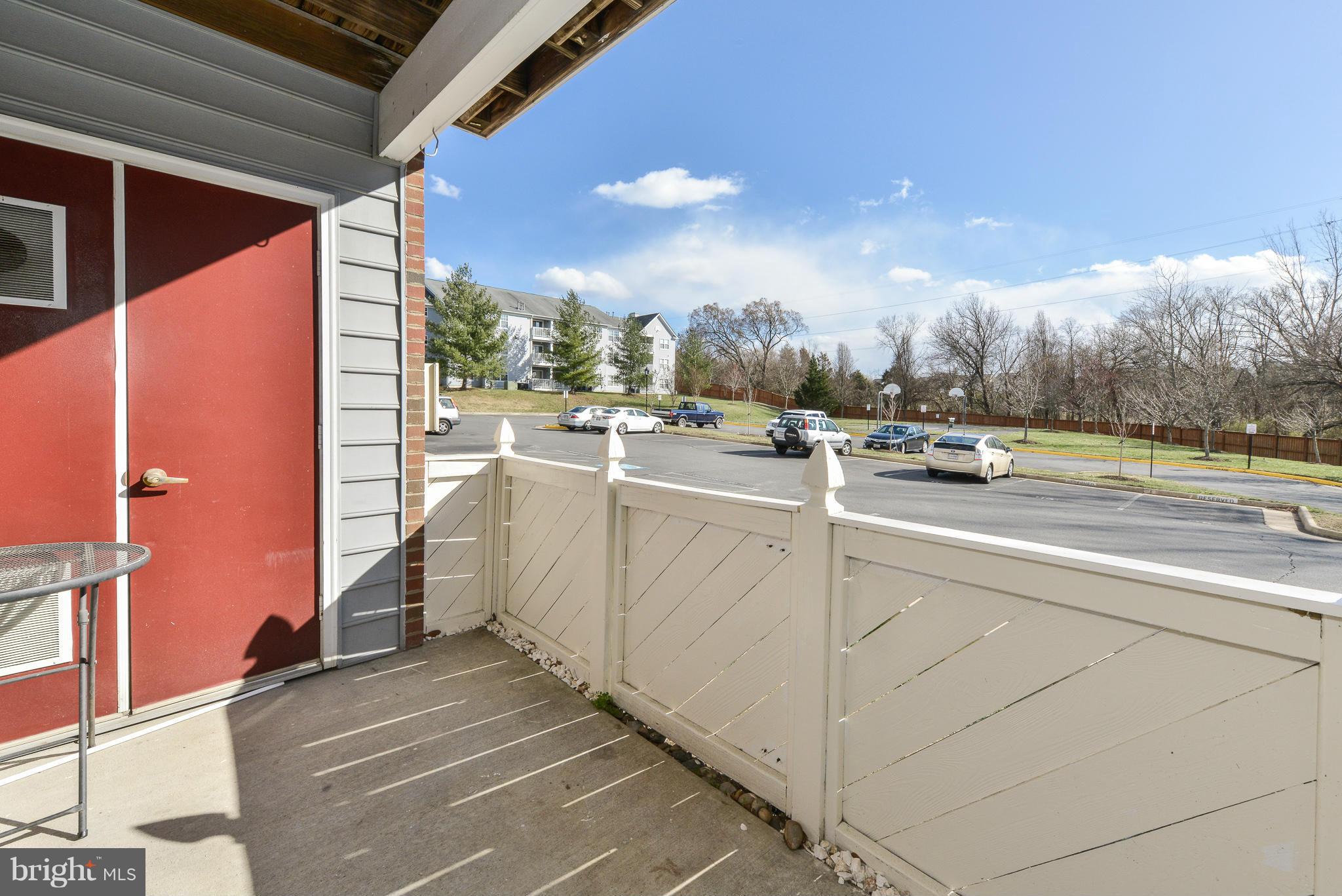 511 Constellation Square Southeast, Unit A Leesburg, VA 20175 - Photo 18 of 27 a view of a room with utility room and car parked