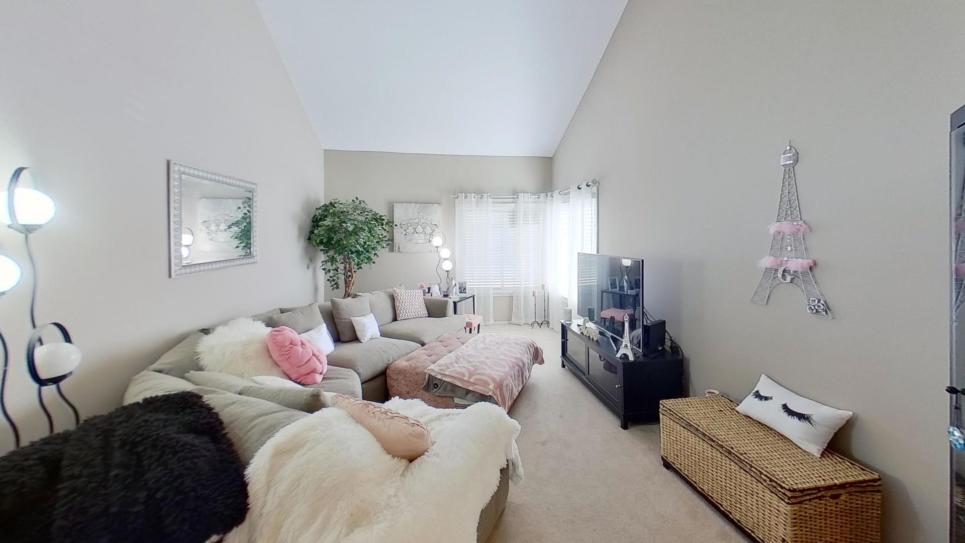 772 Colorado Court, Unit 772 Carol Stream, IL 60188 - Photo 11 of 26 a bedroom with furniture and a window