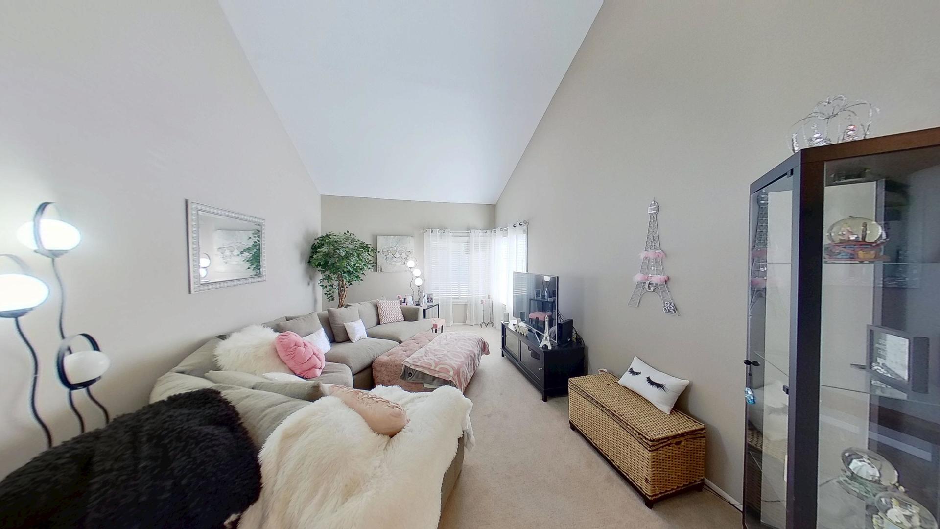 772 Colorado Court, Unit 772 Carol Stream, IL 60188 - Photo 12 of 26 a bedroom with a bed furniture and a window