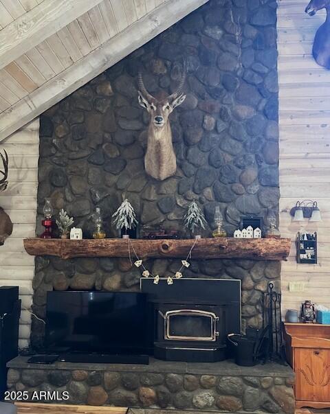 207 Blue Ridge Road Mormon Lake, AZ 86038 - Photo 16 of 66 a fireplace with a clock on top of it