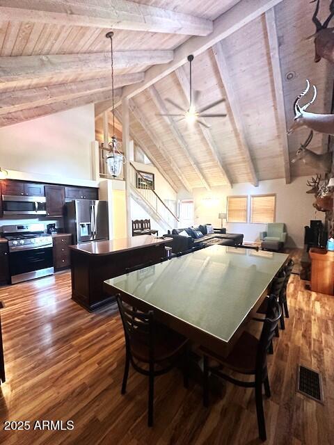 207 Blue Ridge Road Mormon Lake, AZ 86038 - Photo 22 of 66 a view of a dining area with furniture and wooden floor