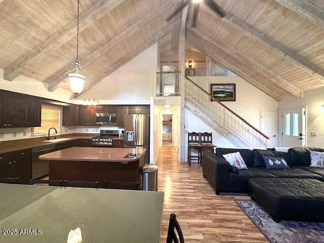 207 Blue Ridge Road Mormon Lake, AZ 86038 - Photo 24 of 66 a living room with stainless steel appliances furniture and a kitchen view
