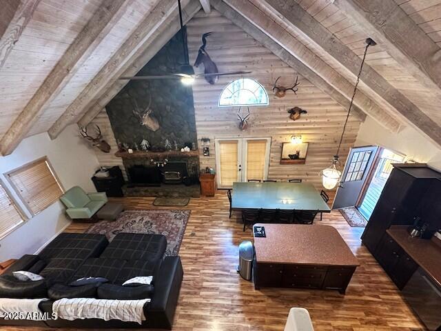 207 Blue Ridge Road Mormon Lake, AZ 86038 - Photo 25 of 66 a living room with furniture and a fireplace