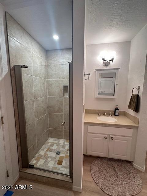 207 Blue Ridge Road Mormon Lake, AZ 86038 - Photo 30 of 66 a bathroom with a sink a toilet a mirror and shower