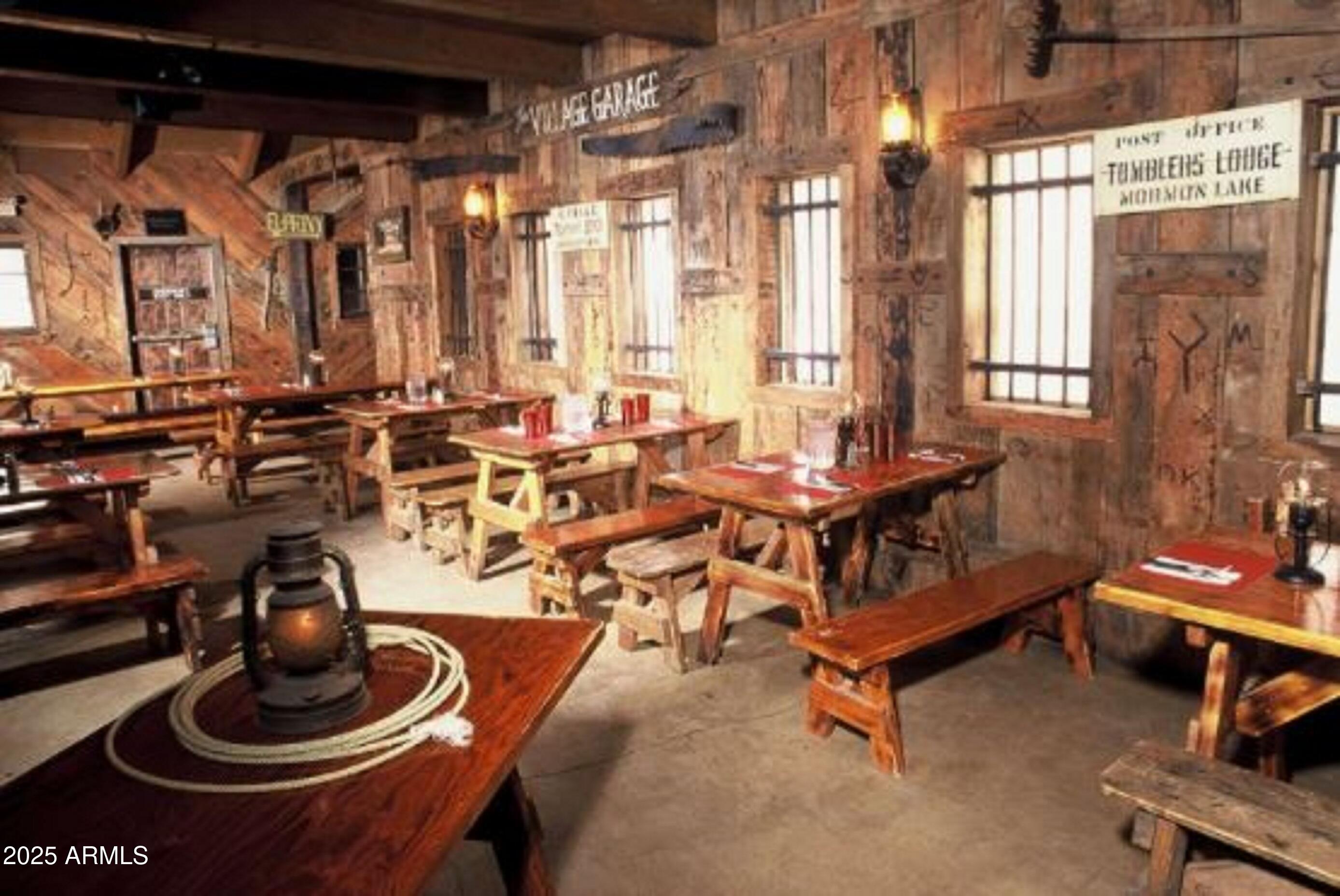 207 Blue Ridge Road Mormon Lake, AZ 86038 - Photo 59 of 66 a room with gym equipment and a large window