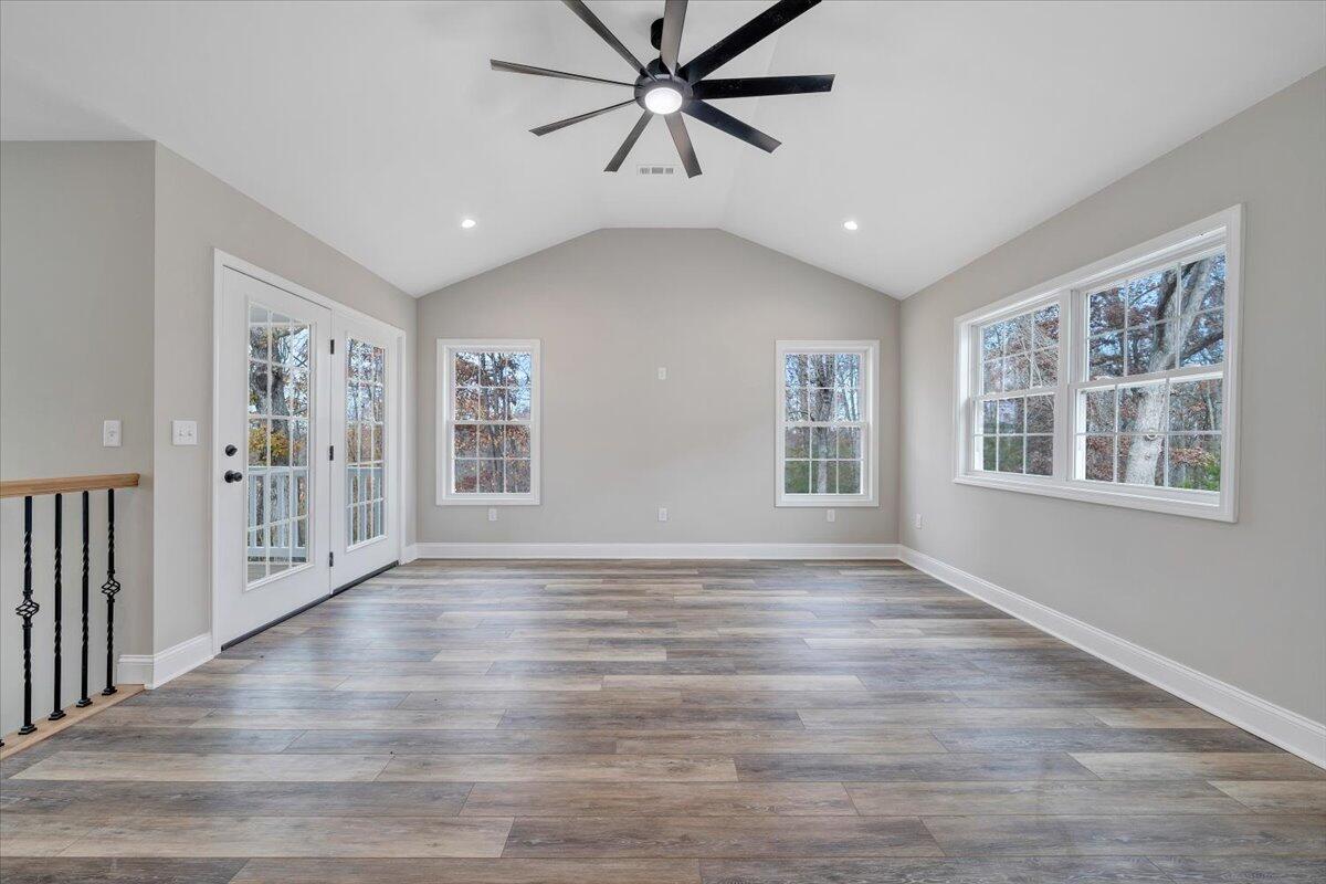 149 Windlass Road Moneta, VA 24121 - Photo 15 of 44 a view of an empty room with window and wooden floor