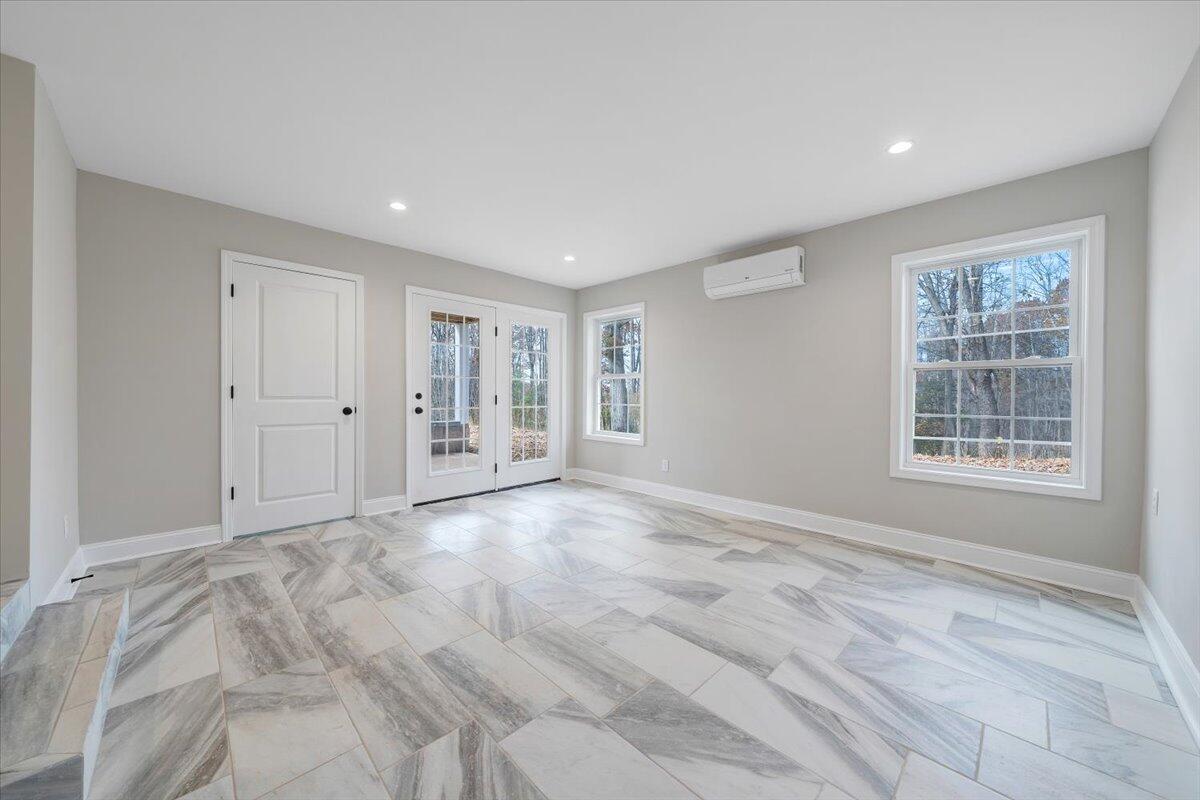 149 Windlass Road Moneta, VA 24121 - Photo 27 of 44 a view of an empty room with a window
