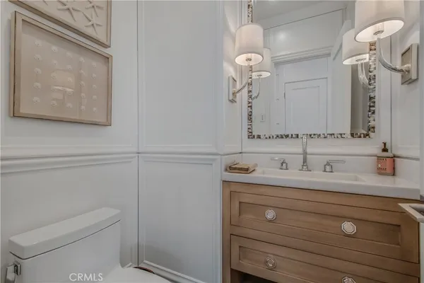a bathroom with a sink and cabinets
