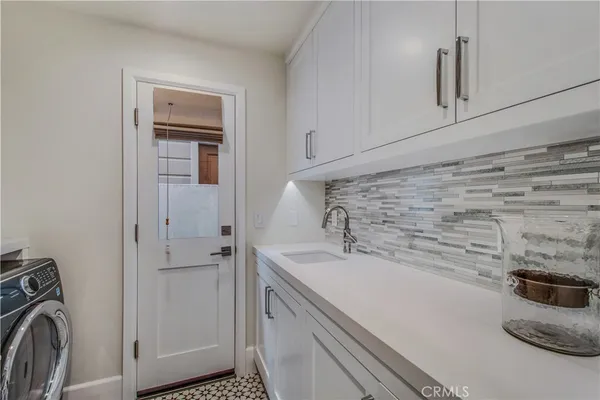 a bed room with a bed and a television