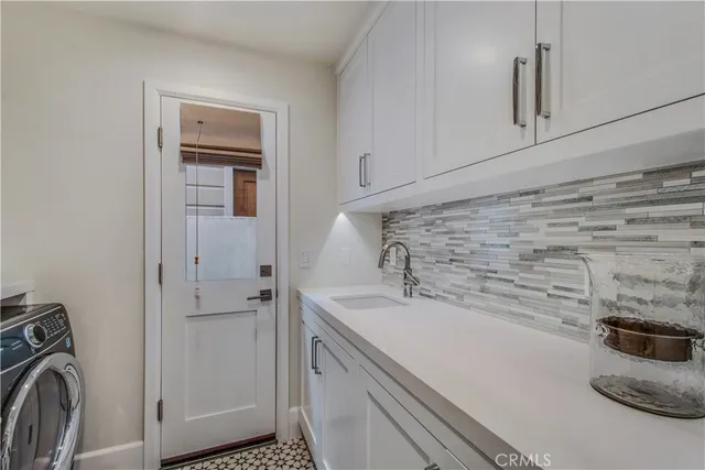 a bed room with a bed and a television