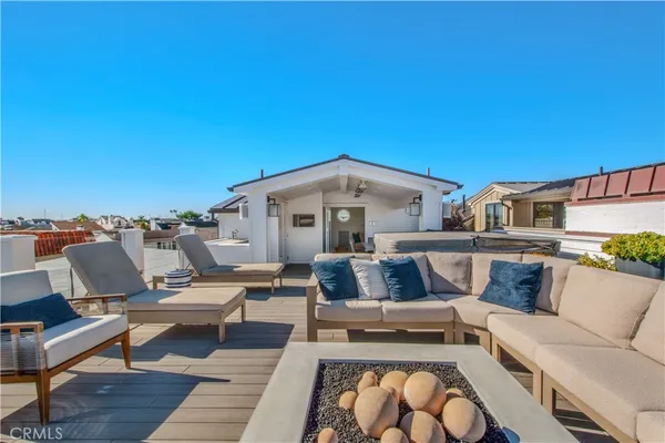 a kitchen with cabinets and wooden floor