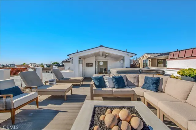 a kitchen with cabinets and wooden floor