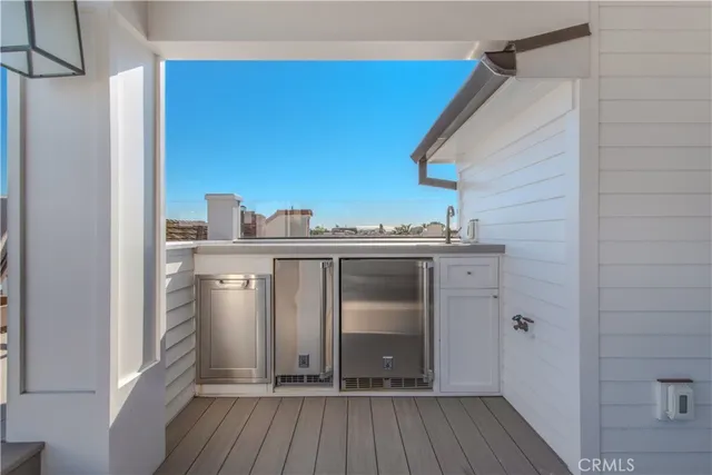 an aerial view of a house with a lake view
