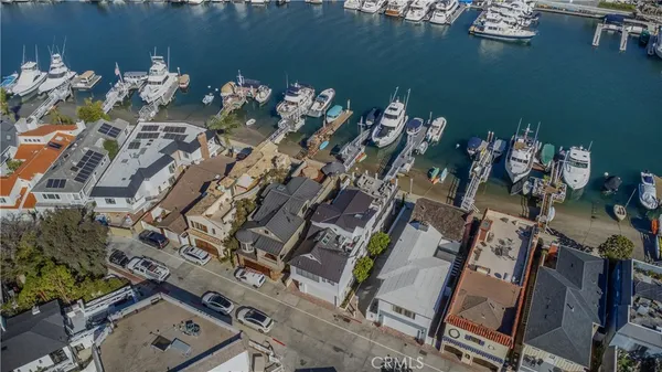 a view of a two chairs in the balcony