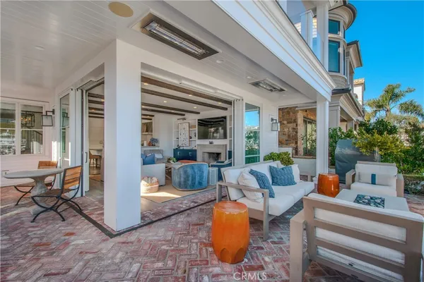 a outdoor living space with patio furniture and a potted plant