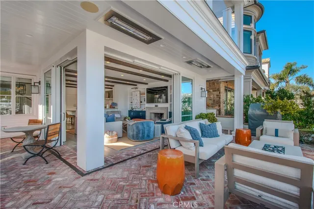 a outdoor living space with patio furniture and a potted plant