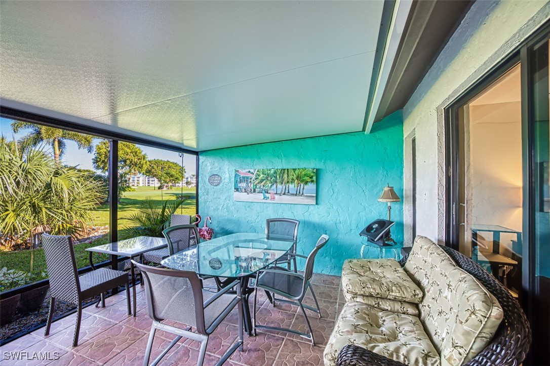 1683 Bent Tree Circle Fort Myers, FL 33907 - Photo 20 of 48 a living room with furniture and a large window