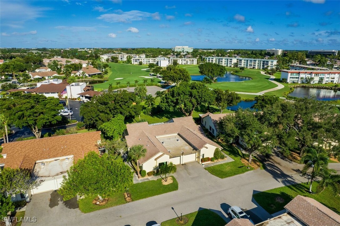 1683 Bent Tree Circle Fort Myers, FL 33907 - Photo 2 of 48 an aerial view of a house with a yard