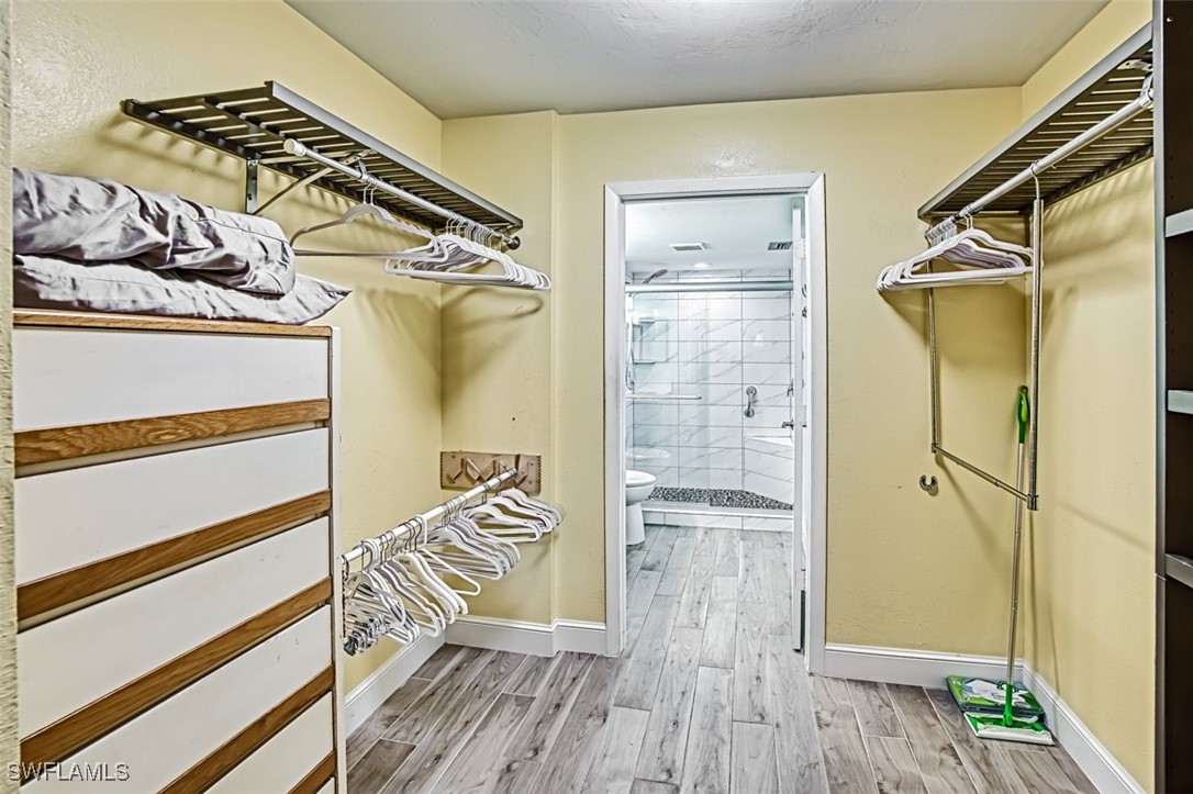 1683 Bent Tree Circle Fort Myers, FL 33907 - Photo 25 of 48 a view of a walk in closet