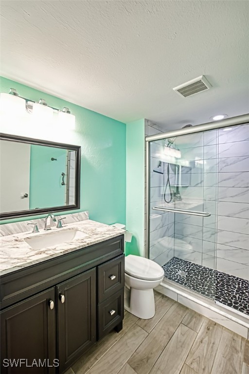 1683 Bent Tree Circle Fort Myers, FL 33907 - Photo 27 of 48 a bathroom with a granite countertop sink toilet and shower