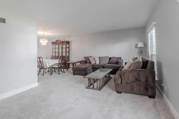 a living room with furniture and a couch