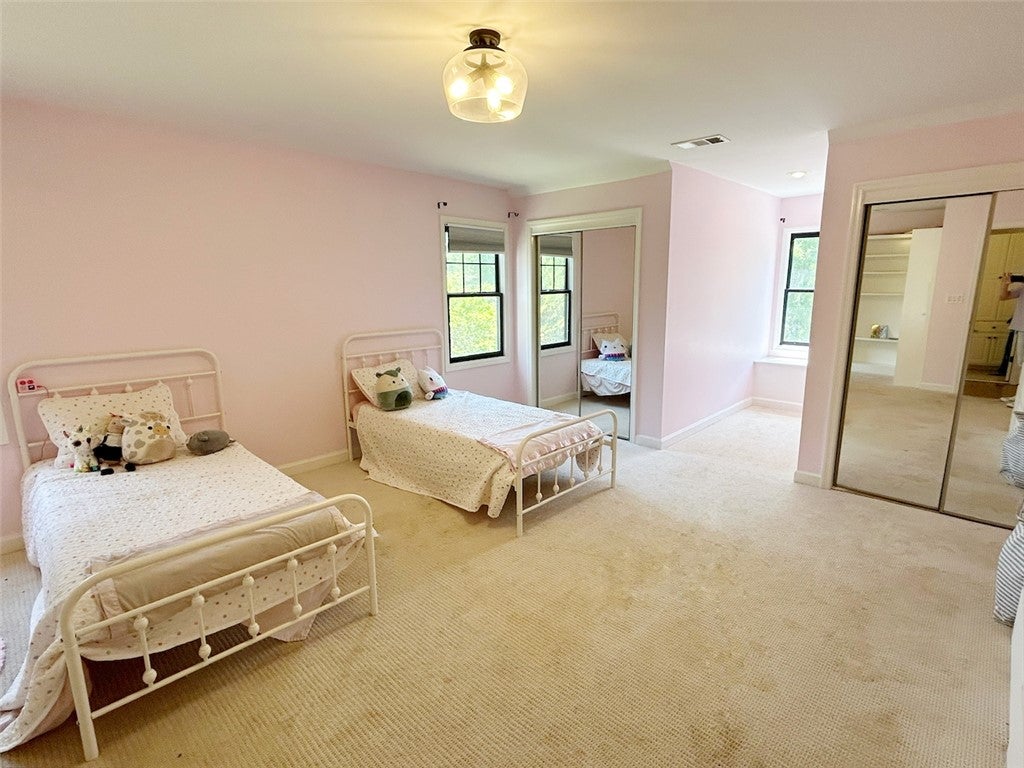 2004 Moores Mill Road Lanett, AL 36863 - Photo 38 of 50 This spacious bedroom offers ample natural light and a comfortable, inviting atmosphere.