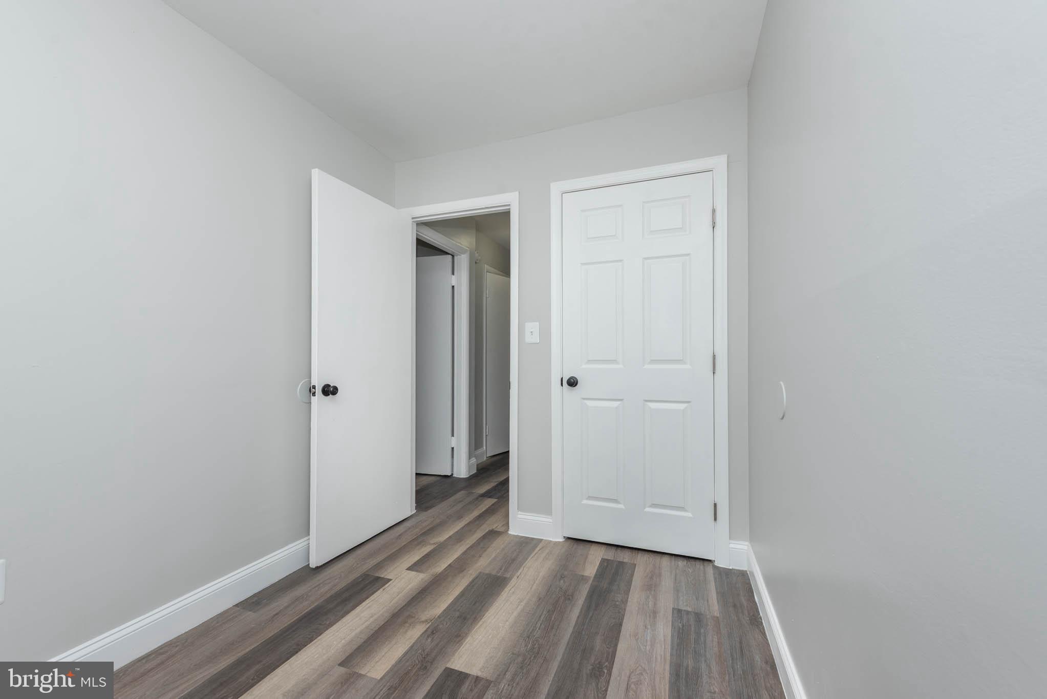 5611 Force Road Baltimore, MD 21206 - Photo 16 of 21 a view of a room with wooden floor and closet