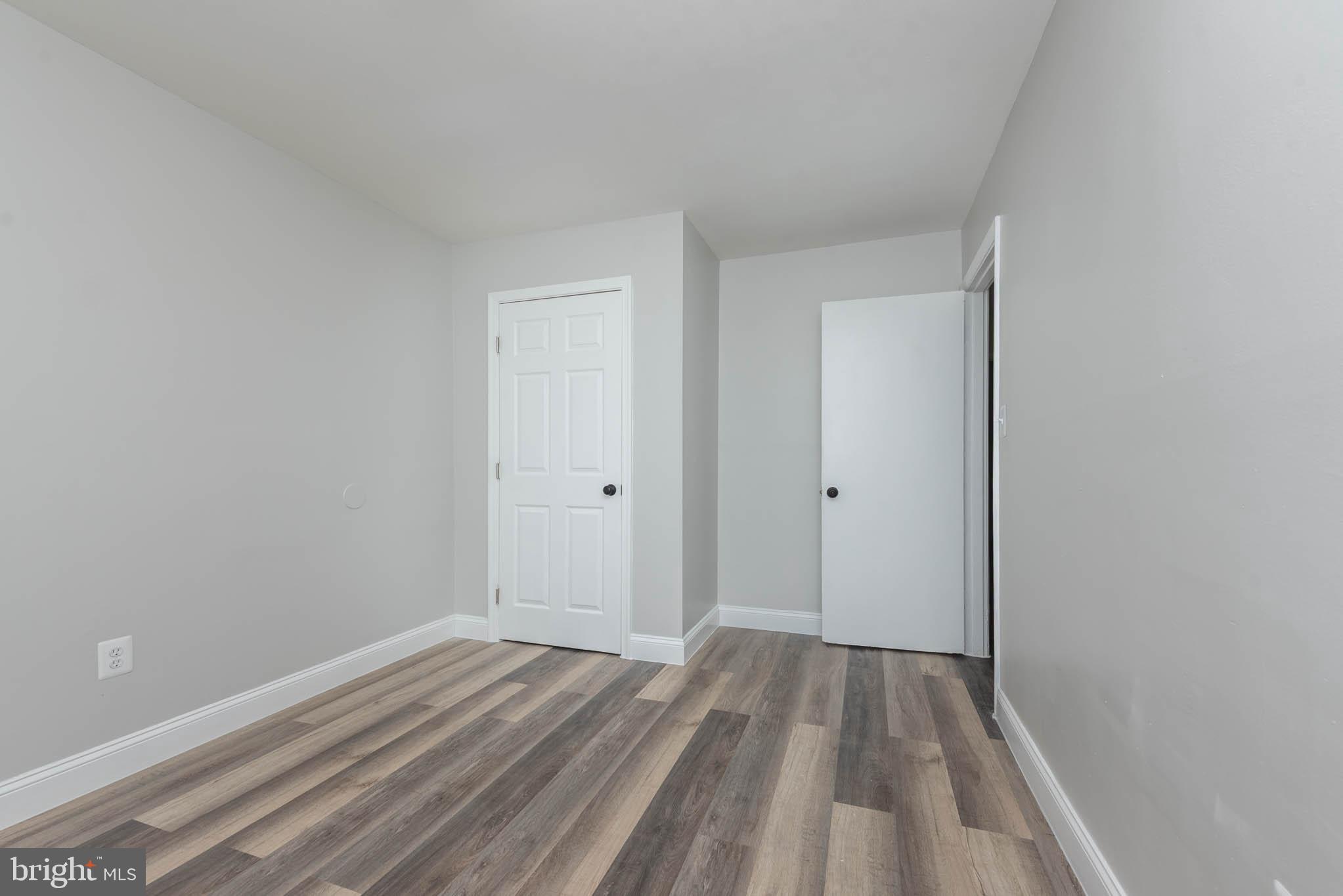 5611 Force Road Baltimore, MD 21206 - Photo 18 of 21 a view of a room with wooden floor