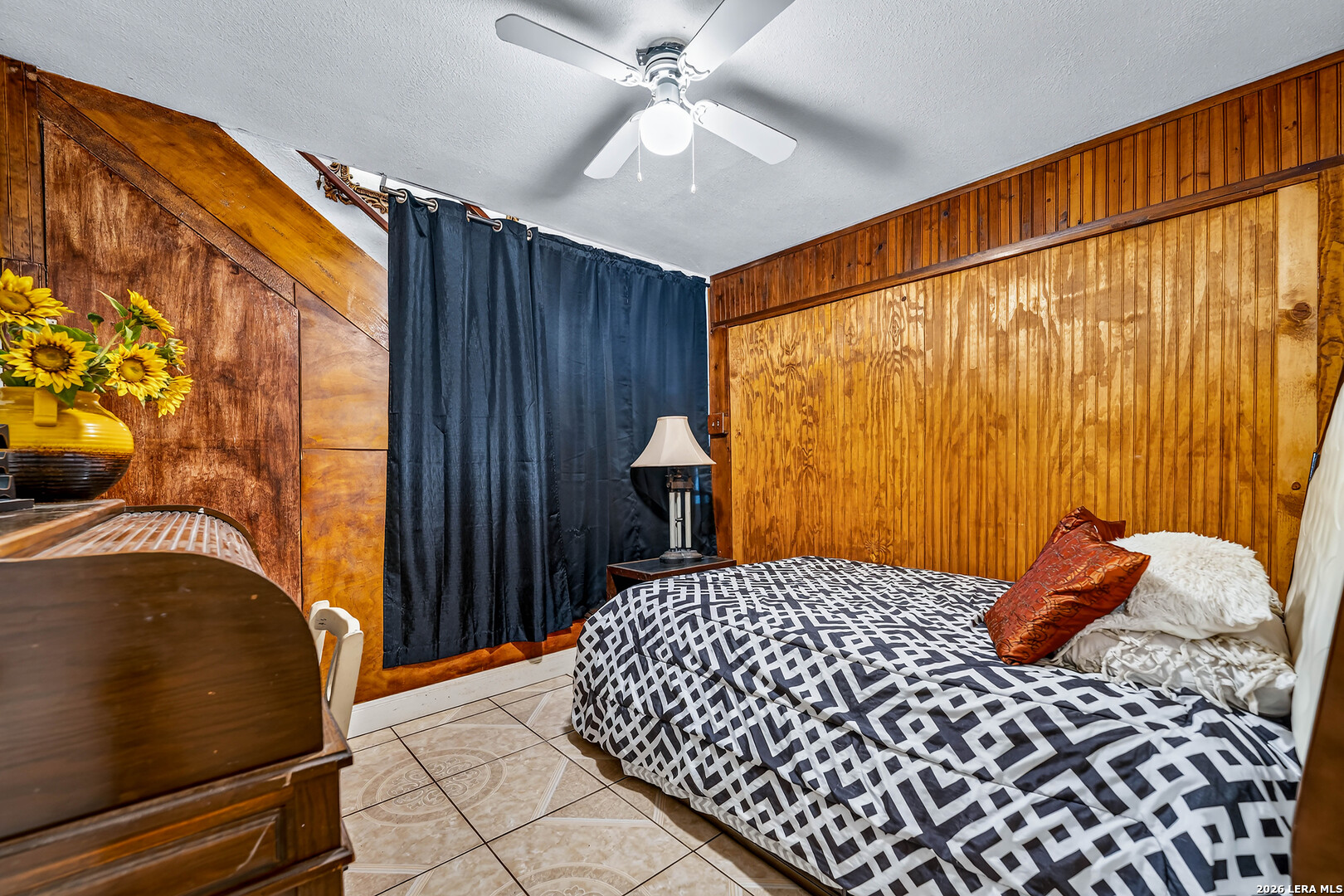 903 East Westmeyer Street Poth, TX 78147 - Photo 11 of 23 a bedroom with a bed and a window
