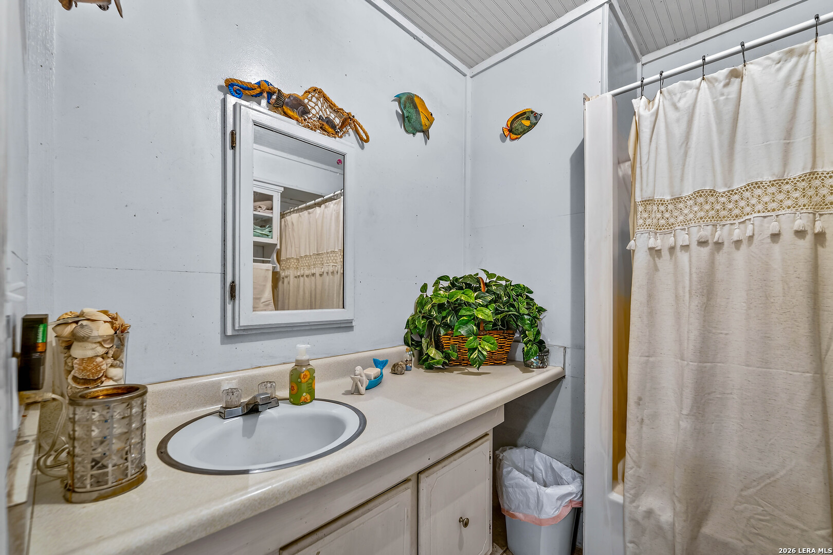 903 East Westmeyer Street Poth, TX 78147 - Photo 13 of 23 a bathroom with a sink toilet and shower