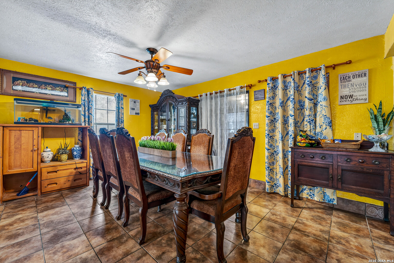 903 East Westmeyer Street Poth, TX 78147 - Photo 6 of 23 a view of a dining room with furniture and chandelier