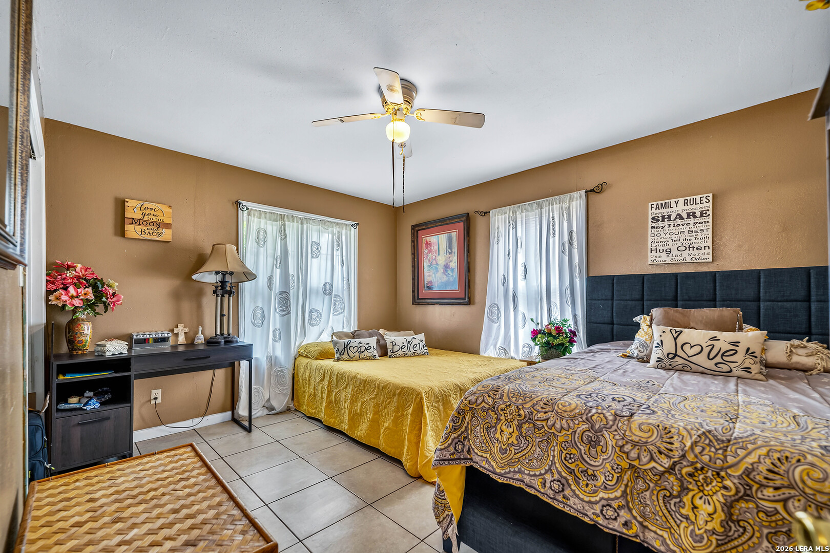 903 East Westmeyer Street Poth, TX 78147 - Photo 10 of 23 a bedroom with a bed and window