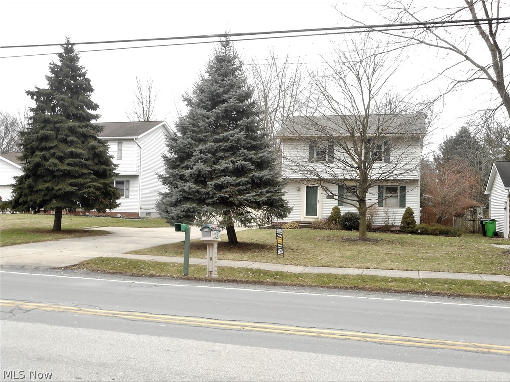 2532 Graham Road Stow, OH 44224 - Photo 22 of 24 Huge pines flank the home and Concrete Driveway.