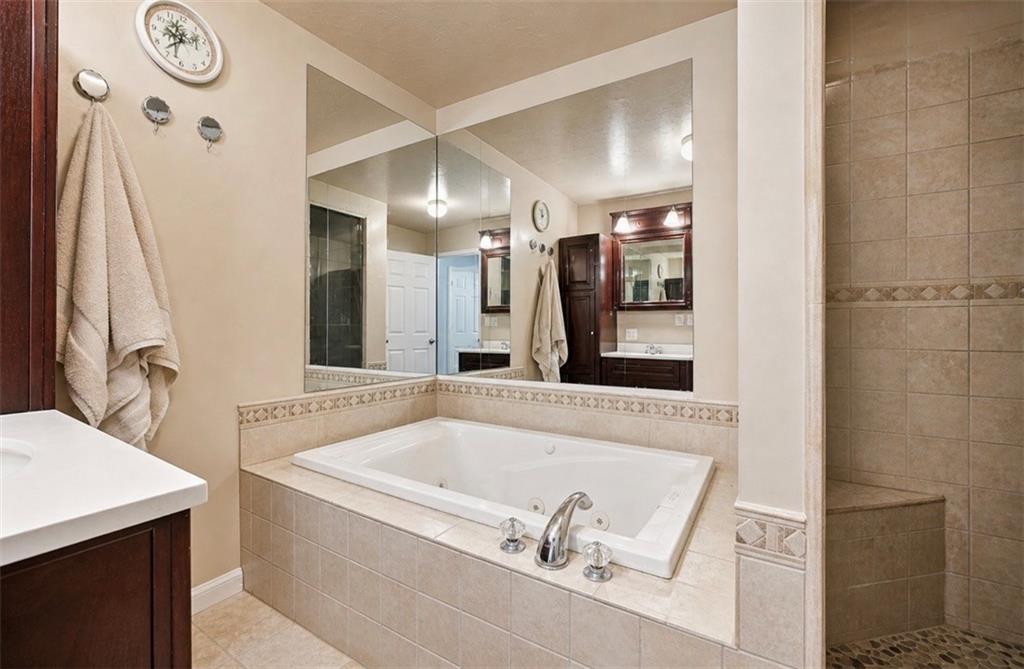 331 Hill Road Georgetown, PA 15043 - Photo 14 of 33 a bathroom with a tub sink and mirror