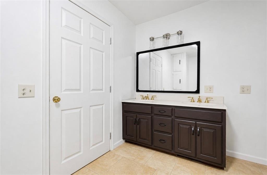 331 Hill Road Georgetown, PA 15043 - Photo 16 of 33 a bathroom with a sink vanity and mirror