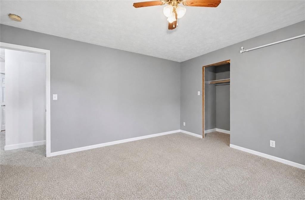 331 Hill Road Georgetown, PA 15043 - Photo 20 of 33 a view of an empty room with a chandelier fan