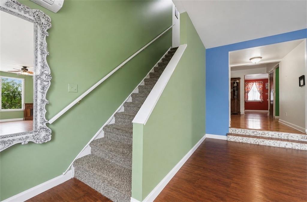 331 Hill Road Georgetown, PA 15043 - Photo 5 of 33 a view of an entryway with wooden floor