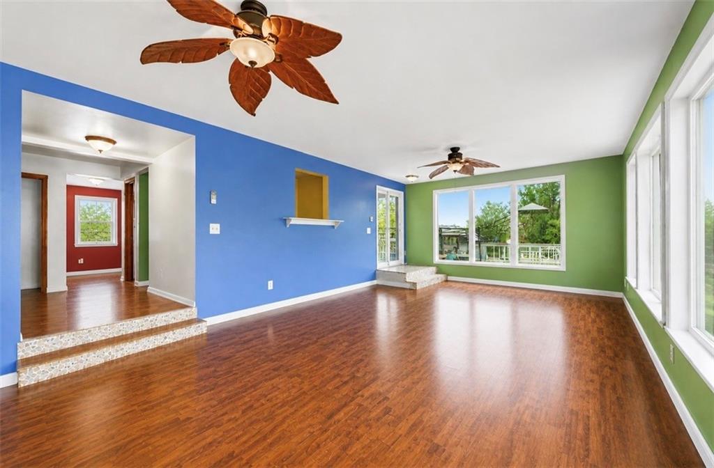 331 Hill Road Georgetown, PA 15043 - Photo 6 of 33 a view of an empty room with wooden floor and a window