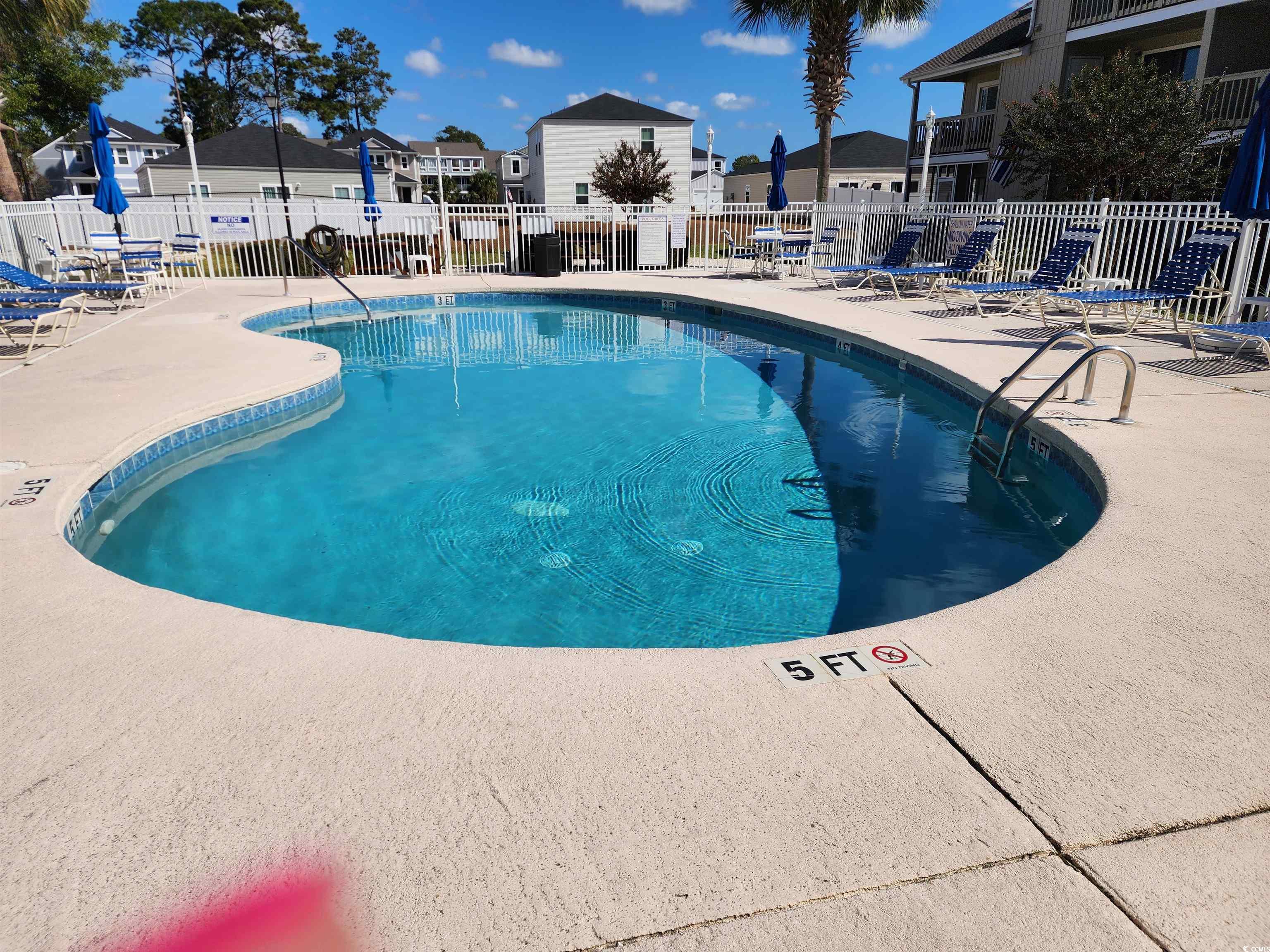1870 Auburn Lane Surfside Beach, SC 29575 - Photo 17 of 18 View of swimming pool with a patio area