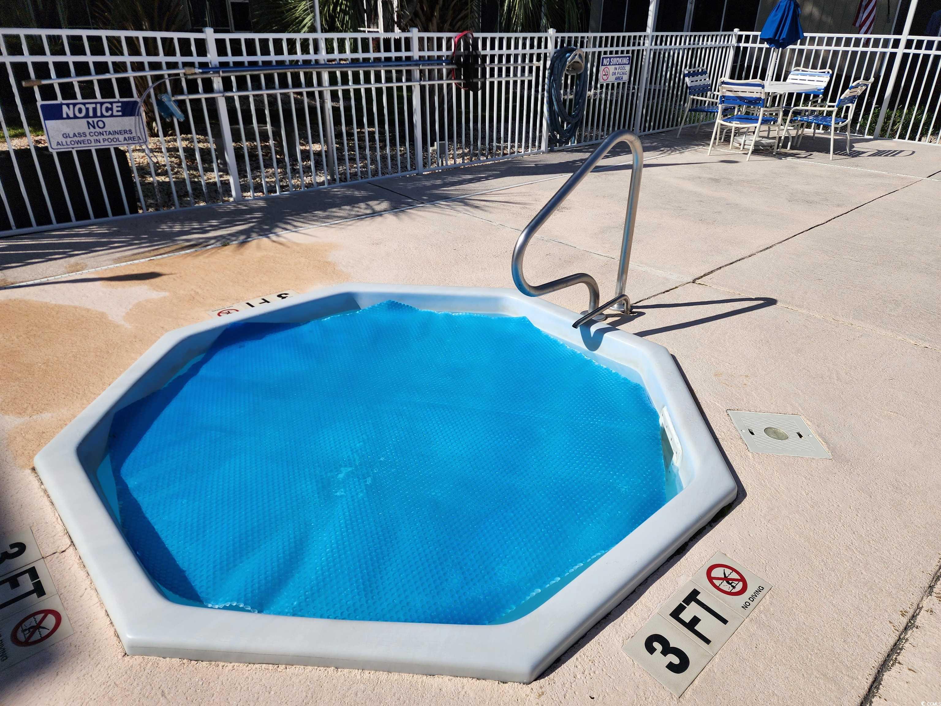 1870 Auburn Lane Surfside Beach, SC 29575 - Photo 18 of 18 View of pool with a patio area