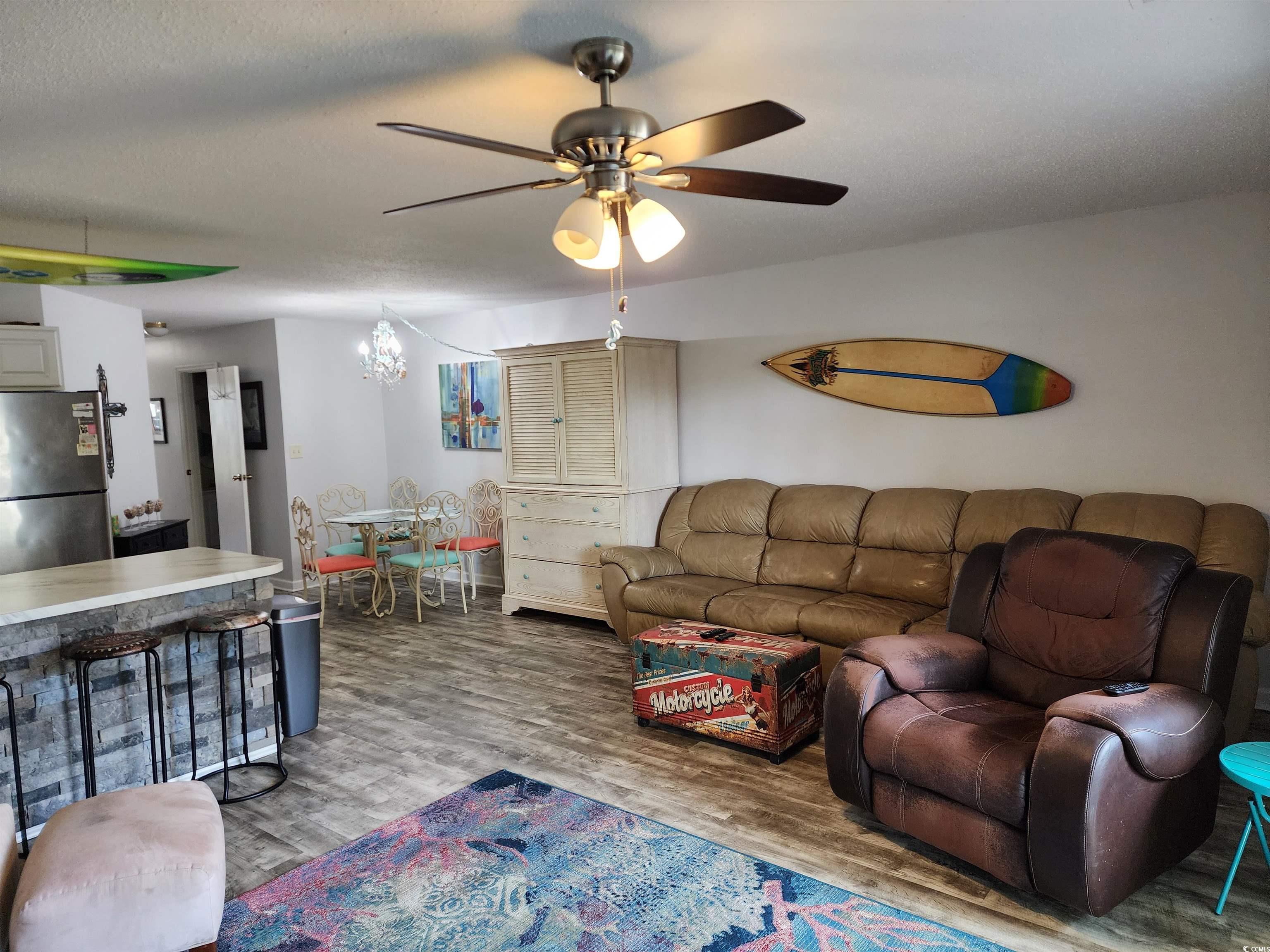 1870 Auburn Lane Surfside Beach, SC 29575 - Photo 3 of 18 Living room featuring ceiling fan with notable cha