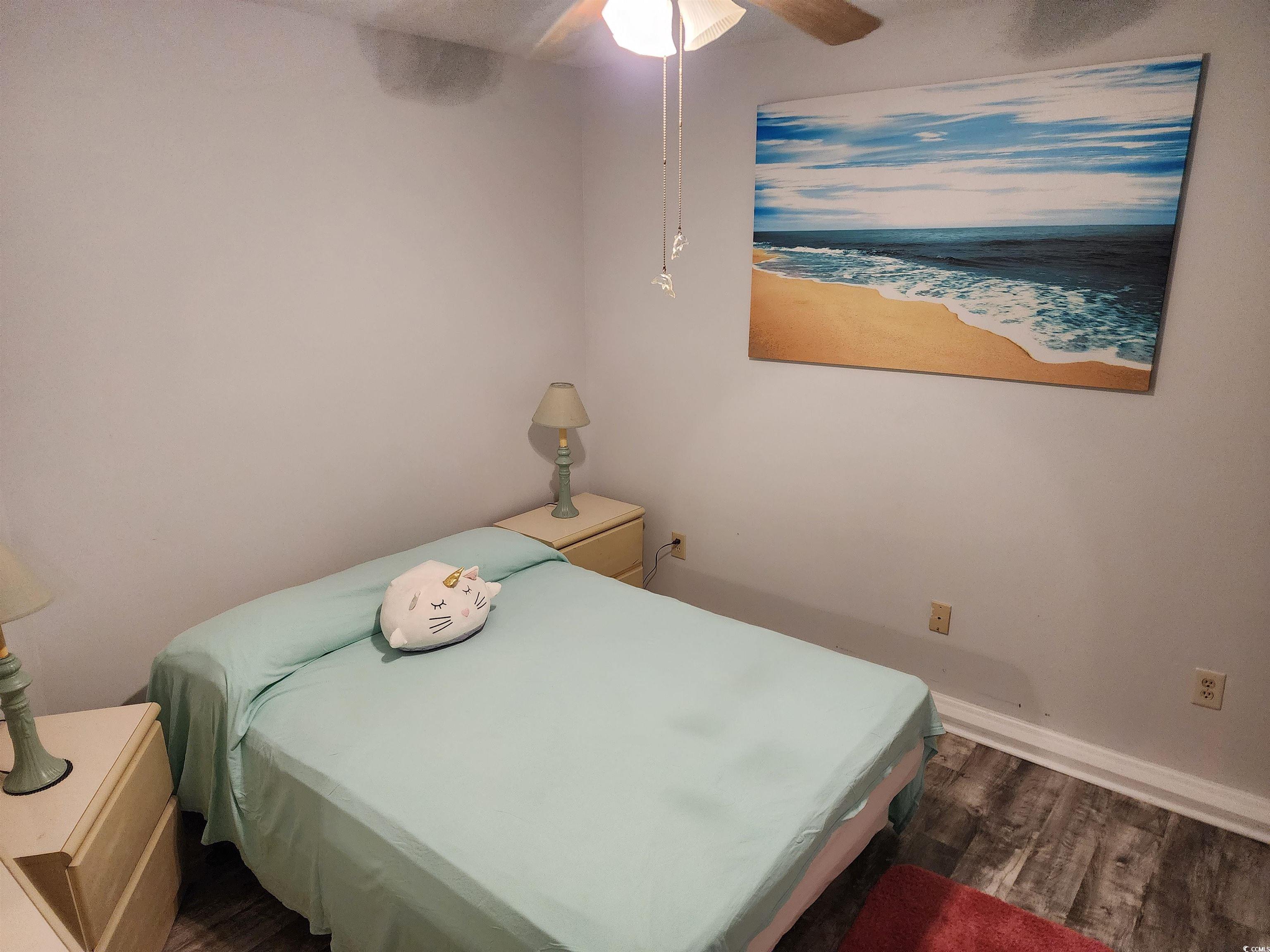 1870 Auburn Lane Surfside Beach, SC 29575 - Photo 10 of 18 Bedroom with ceiling fan and dark hardwood / wood-