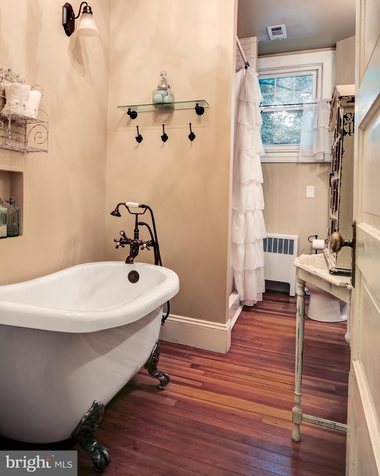 606 Amoss Road Severna Park, MD 21146 - Photo 27 of 49 1st floor bath w/ claw foot tub & separate shower