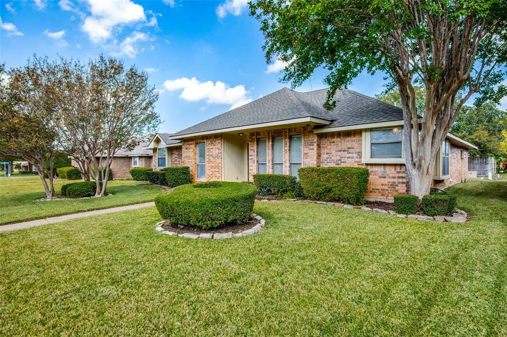2005 Espinosa Drive Carrollton, TX 75010 - Photo 1 of 1 a front view of a house with a yard