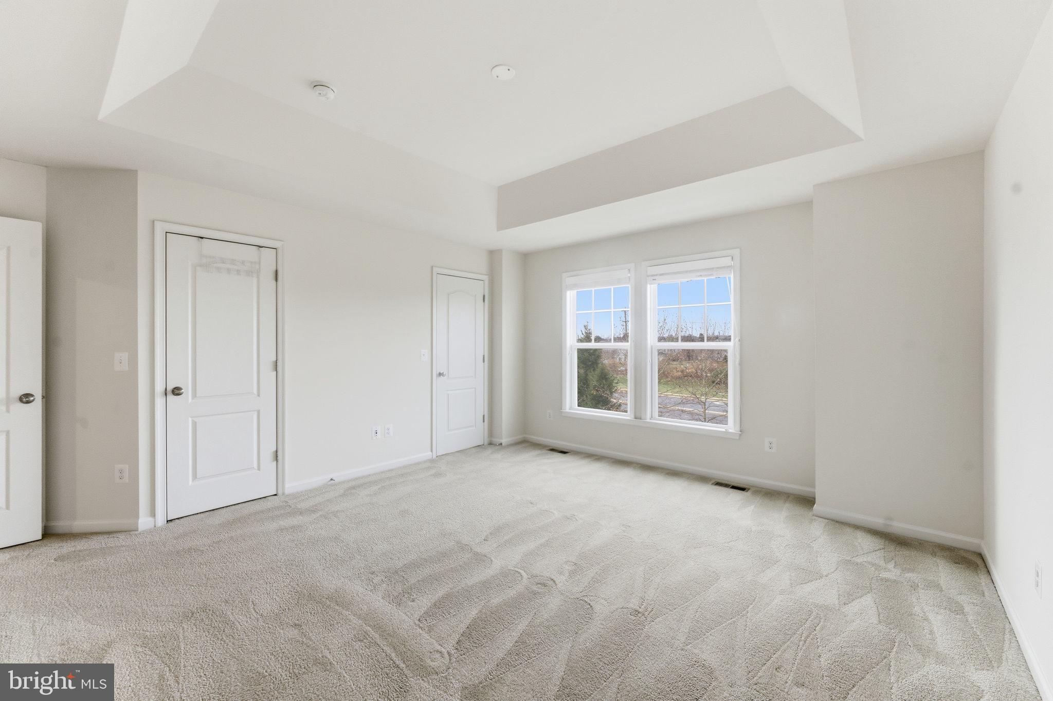 42396 Benfold Square Brambleton, VA 20148 - Photo 26 of 65 a view of an empty room with a window