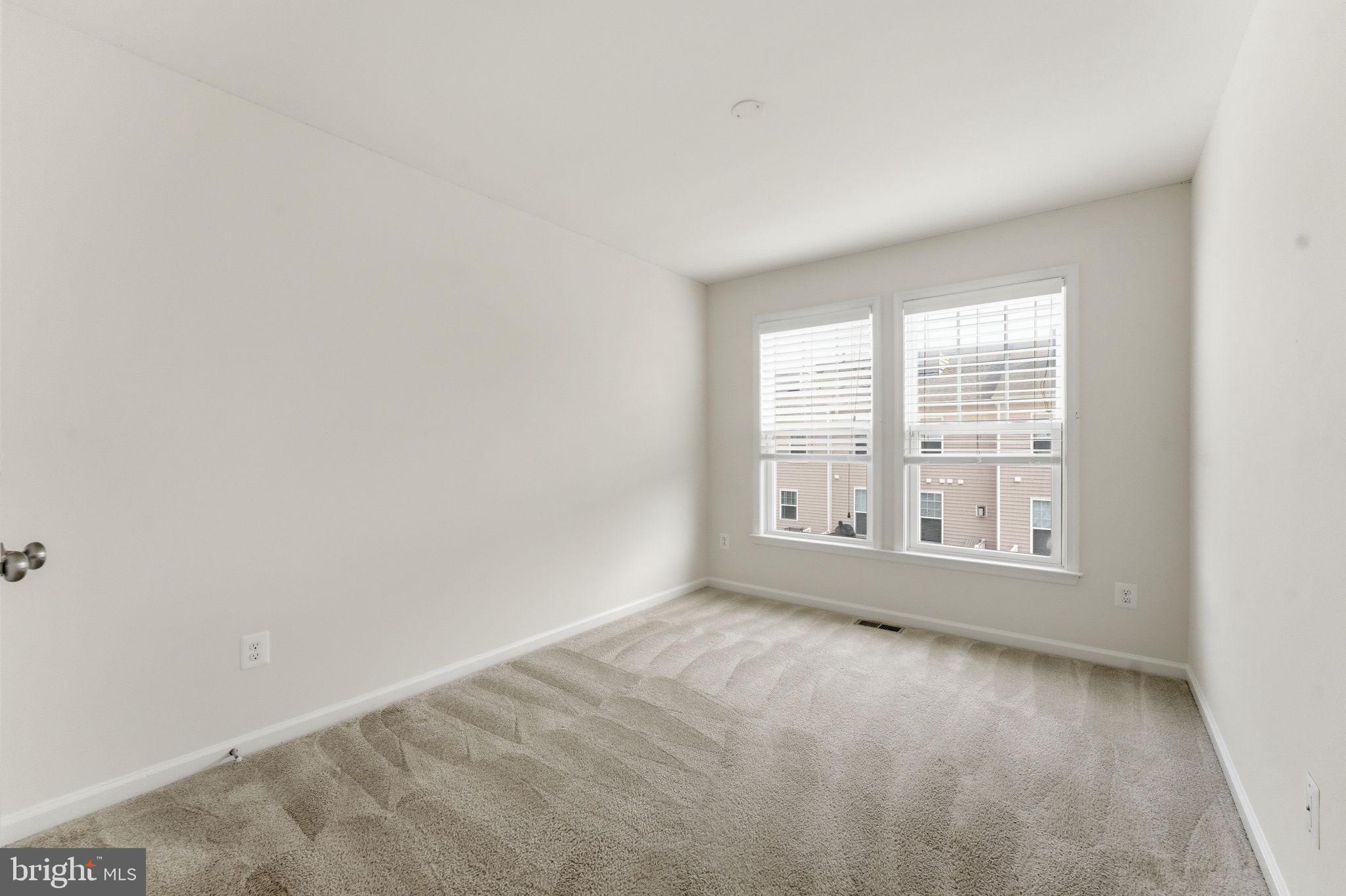42396 Benfold Square Brambleton, VA 20148 - Photo 35 of 65 an empty room with a window
