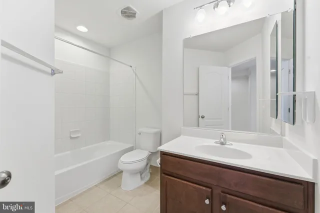 an aerial view of a city with ocean view