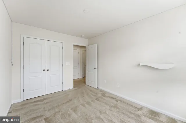 a front view of residential houses with street